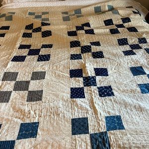 Elegant Blue and White Patchwork Quilt
